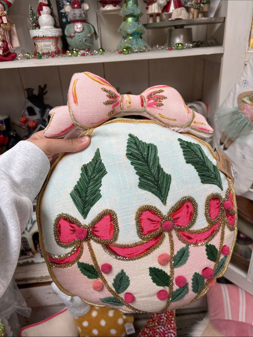 Creative Co-Op Pink and Green Holiday Bow Round Accent Pillow